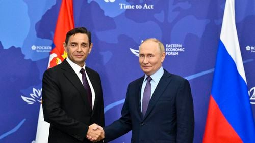 Russian President Vladimir Putin, right, and Serbian Deputy Prime Minister Aleksandar Vulin pose for a photo on the sidelines of the Eastern Economic Forum in Vladivostok, Russia, Wednesday, Sept. 4, 2024. (Kristina Kormilitsyna, Sputnik, Kremlin Pool Photo via AP)