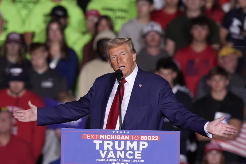 Republican presidential nominee former President Donald Trump speaks at a campaign event at the Ryder Center at Saginaw Valley State University, Thursday, October. 2, 2024 in University Center, Mich. (AP Photo/Carlos Osorio)