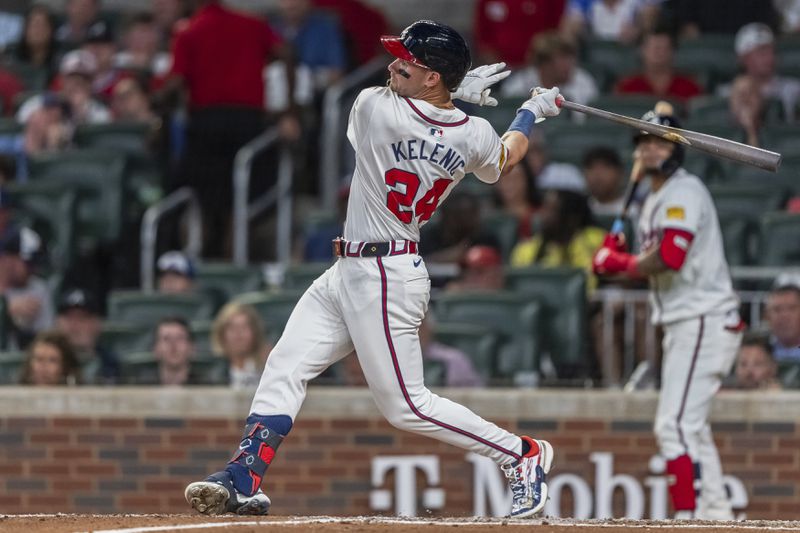 Atlanta Braves' Jarred Kelenic (24) swings for a strike called in the seventh inning of a baseball game against the Philadelphia Phillies, Wednesday, Aug. 21, 2024, in Atlanta. (AP Photo/Jason Allen)