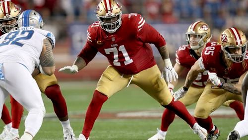 FILE - San Francisco 49ers offensive tackle Trent Williams (71) blocks during the NFC Championship NFL football game against the Detroit Lions in Santa Clara, Calif., Jan. 28, 2024. (AP Photo/Scot Tucker, File)