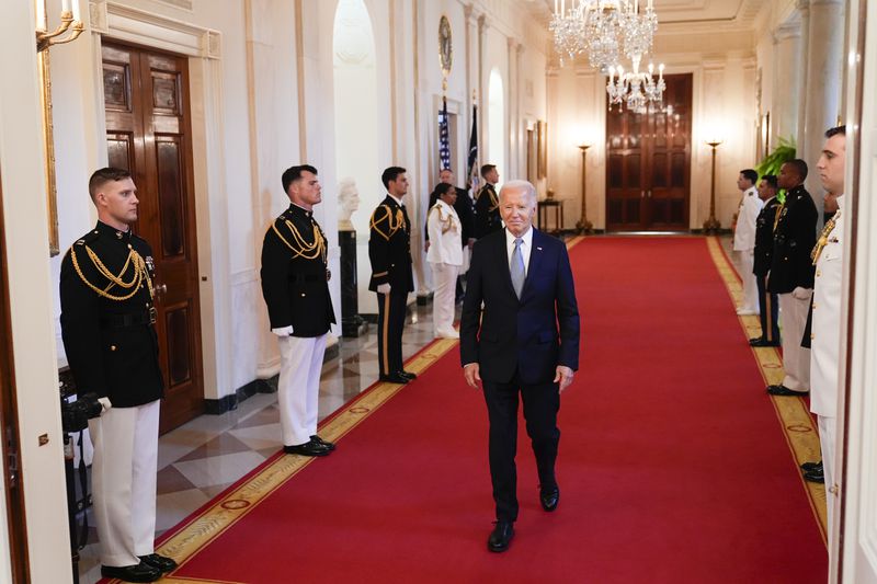 President Joe Biden arrives for a Medal of Honor Ceremony at the White House in Washington, Wednesday, July 3, 2024, posthumously honoring two U.S. Army privates who were part of a daring Union Army contingent that stole a Confederate train during the Civil War. U.S. Army Pvts. Philip G. Shadrach and George D. Wilson were captured by Confederates and executed by hanging. (AP Photo/Susan Wals