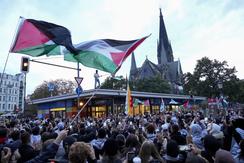 People take part in a pro-Palestinian rally in Berlin, Monday, Oct. 7, 2024. (AP Photo/Ebrahim Noroozi)