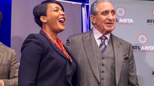 01/28/2019 -- Atlanta, Georgia -- Atlanta Mayor Keisha Lance Bottoms laughs while speaking with Atlanta Falcons owner Arthur M. Blank following a 'Welcome to Super Bowl LIII' press conference at the Georgia World Congress Center in Atlanta, Monday, January 28, 2019. (ALYSSA POINTER/ALYSSA.POINTER@AJC.COM)