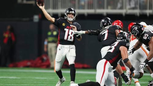 Atlanta Falcons quarterback Kirk Cousins (18) attempts a pass during the second quarter against the Kansas City Chiefs at Mercedes-Benz Stadium, Sunday, Sept. 22, 2024, in Atlanta. (Jason Getz / AJC)

