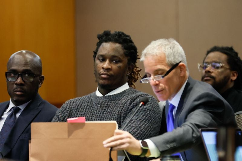 Young Thug, whose real name is Jeffery Lamar Williams, observes his lawyer, Brian Steel, working with the microphone during the hearing of the key witness Kenneth Copeland at the Fulton County Superior Courton on Monday, June 10, 2024.
(Miguel Martinez / AJC)