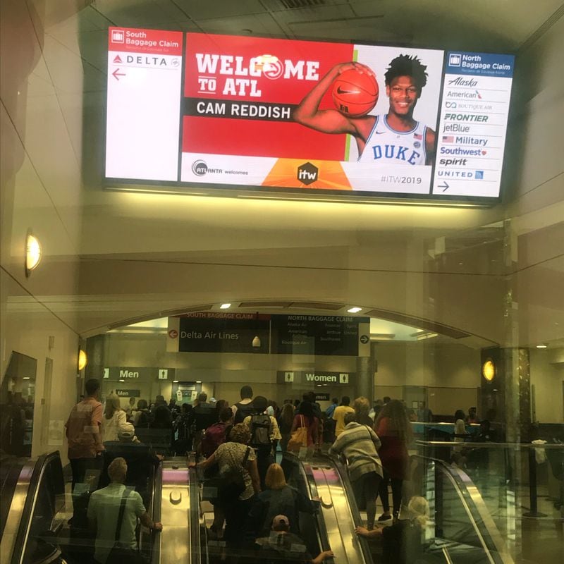 A sign greets Hawks draft pick Cam Reddish on his arrival at the airport Sunday.