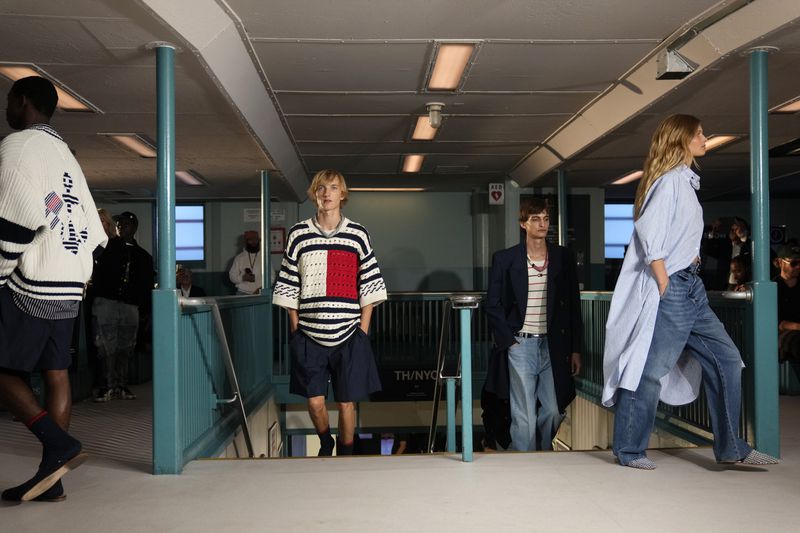 Models walk the runway during the Tommy Hilfiger Spring/Summer 2025 fashion show onboard a Staten Island Ferry as part of New York Fashion Week on Sunday, Sept. 8, 2024, in New York. (Photo by Charles Sykes/Invision/AP)