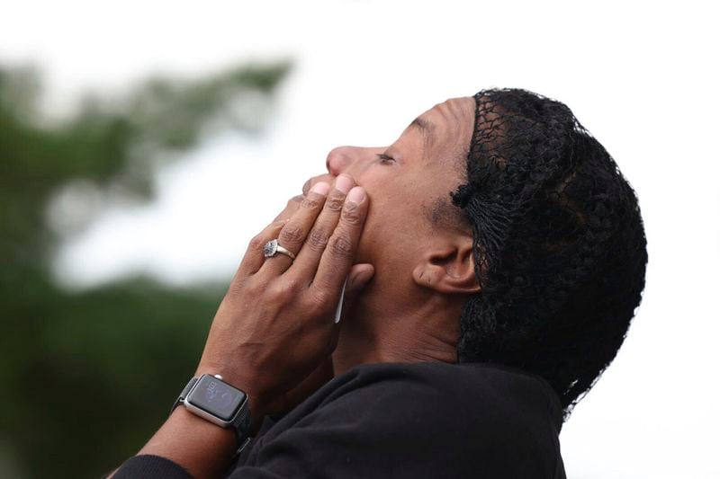 Pamela Caraballo, who has a child at the Northwest High School, reacts as she waits outside the school for students to be released after a shooting was reported Tuesday, Sept. 10, 2024, in Omaha, Neb. (Megan Nielsen/Omaha World-Herald via AP)