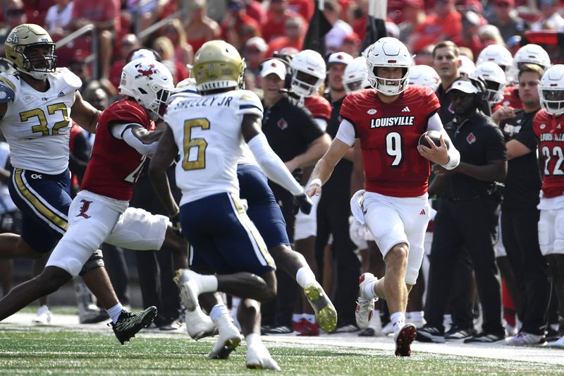 Louisville quarterback Tyler Shough (9) runs for a first down during the first half of an NCAA college football game in Louisville, Ky., Saturday, Sept. 21, 2024. (AP Photo/Timothy D. Easley)