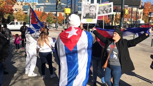 Cuban Americans held a rally in downtown Atlanta on Sunday, November 14, 2021 to advocate for change in their homeland, and to support activists in Cuba planning a day of protests the following day.