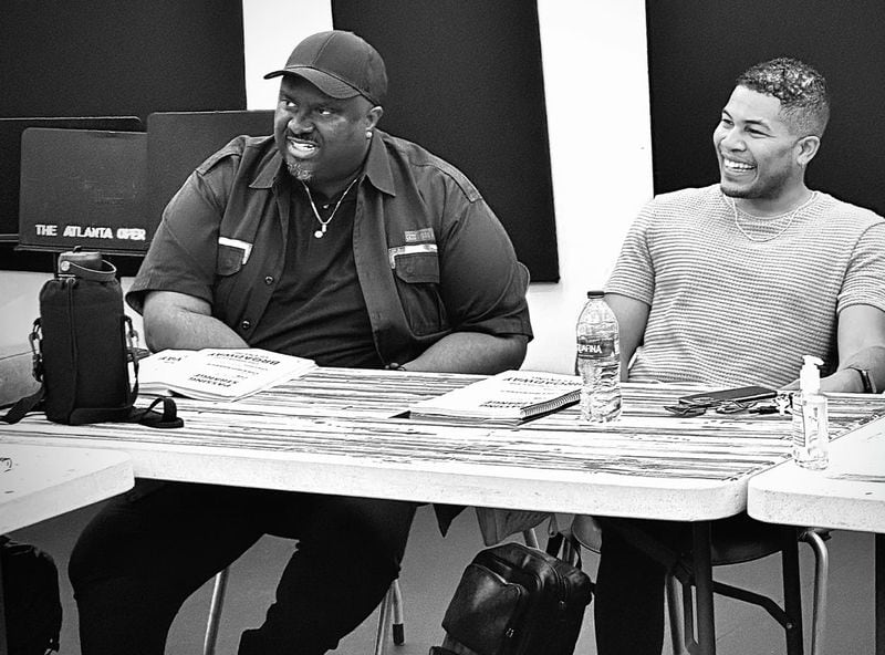 Bradley Raymond (left), the musical's narrator, and Christian Magby, who plays Youth, react during a rehearsal "Passing Strange." Photo: Courtesy of Theatrical Outfit