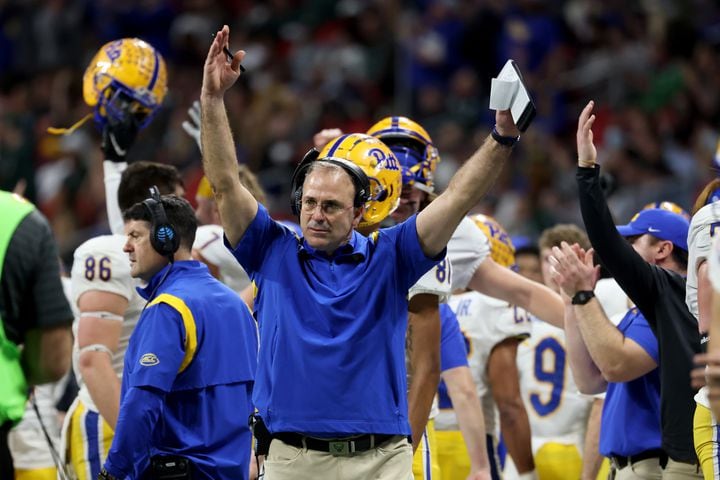 Pittsburgh Panthers head coach Pat Narduzzi reacts after a receiving touchdown is confirmed by officials during the first half against the Michigan State Spartans in the Chick-fil-A Peach Bowl at Mercedes-Benz Stadium in Atlanta, Thursday, December 30, 2021. JASON GETZ FOR THE ATLANTA JOURNAL-CONSTITUTION