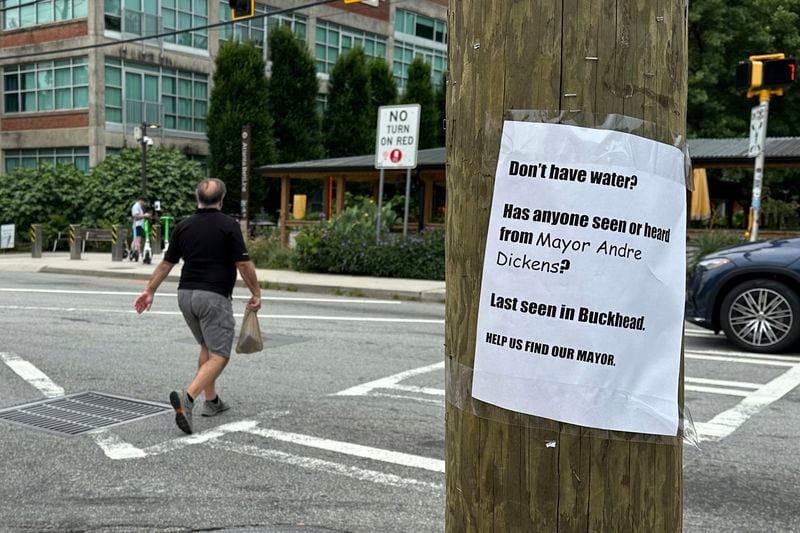 A sign expressing frustration with the city of Atlanta's response after water pipe corrosion caused interruptions in water service to homes and businesses is seen along the Beltline Trail in the city's Reynoldstown neighborhood on Saturday, June 1, 2024. Atlanta authorities were slowly clamping down on the city's water system on Saturday after corroded water pipes burst in downtown and midtown, forcing the closure of many businesses and attractions and affecting water service to area homes. .  (AP Photo/Kate Brumback)
