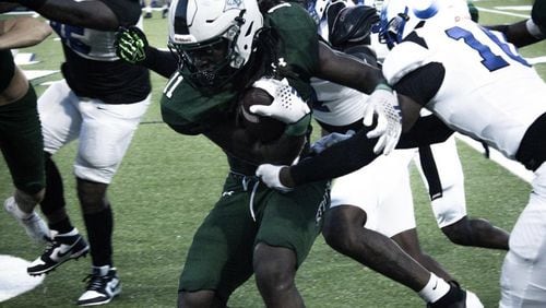 Eastside's Jayden Barr ran for 65 yards and had four tackles in the opening win over Newton. (Photo by Jeremiah Ferdilus)