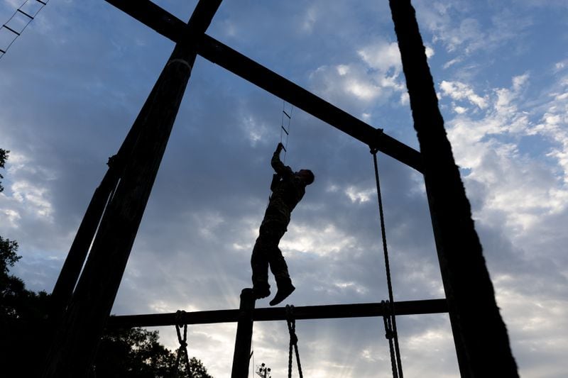 Maj. Jack Gibson completes obstacle course training at Fort Moore in Columbus. His late grandfather, Jim Shalala, volunteered for the 2nd Ranger Battalion, an elite Army unit that was organized at Camp Forrest near Tullahoma, Tennessee. (Arvin Temkar / AJC)