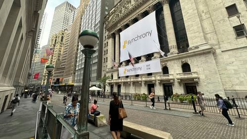 People pass the New York Stock Exchange on Wednesday, July 31, 2024 in New York. Global stocks have advanced and oil prices jumped more than $2 a barrel after Hamas's top political leader died in an air strike.(AP Photo/Peter Morgan)