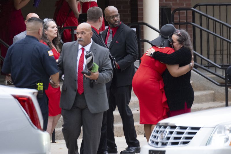 Family members leave after the funeral of Apalachee High School shooting victim Mason Schermerhorn in Jefferson, Ga., on Saturday, Sept. 14, 2024. (Ben Gray/Atlanta Journal-Constitution via AP)