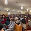 Congregants attend Eglise Porte Etroite, a Creole-language church which has gone from seven attendees to close to 300 in under 15 years, in Albertville, Ala., Sept. 29, 2024. (AP Photo/Safiyah Riddle)