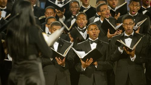 Tyler Hill (right) and Raymond Bell perform on stage during the 86th Annual Morehouse-Spelman Christmas Carol Concert at the Sisters Chapel on campus on Saturday, December 1, 2012. Close to 100 singers from both the Spelman College and Morehouse College glee clubs performed 28 holiday songs.