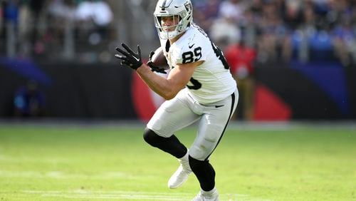 FILE - Las Vegas Raiders tight end Brock Bowers (89) carries the ball during the second half of an NFL football game against the Baltimore Ravens, Sept. 15, 2024, in Baltimore. (AP Photo/Nick Wass, File)