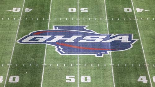 The GHSA logo is shown at midfield during a break in the action of the Class 3A GHSA State Championship game at Mercedes-Benz Stadium, Wednesday, December. 13, 2023, in Atlanta. (Jason Getz / Jason.Getz@ajc.com)