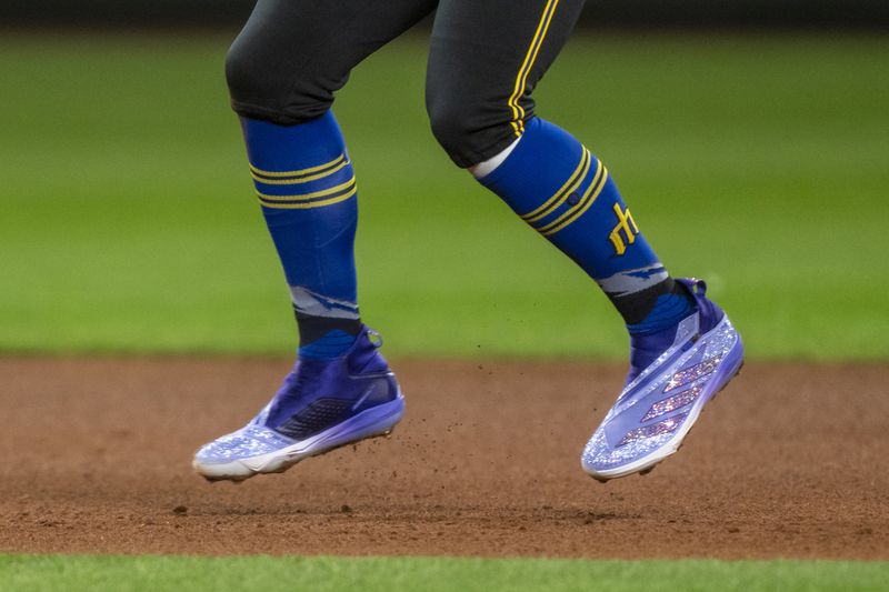 Seattle Mariners' Julio Rodriguez's cleats, featuring Swarovski crystals, are seen during the third inning of a baseball game against the New York Yankees, Tuesday, Sept. 17, 2024, in Seattle. (AP Photo/Stephen Brashear)