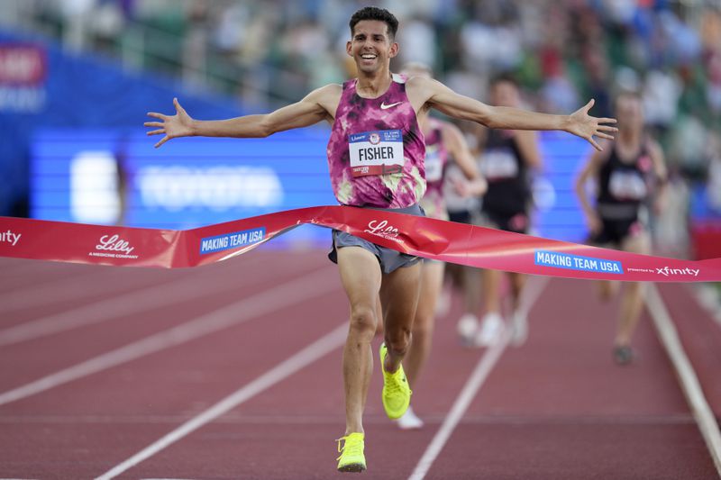 Grant Fisher wins the final in the men's 10000-meter run during the U.S. Track and Field Olympic Team Trials Friday, June 21, 2024, in Eugene, Ore. (AP Photo/Charlie Neibergall)