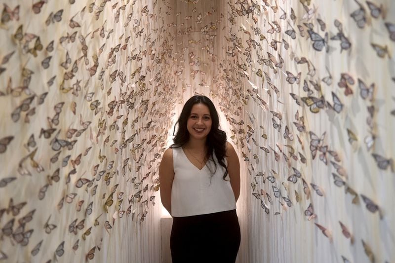 Atlanta-based artist Yehimi Cambron (shown here with her Atlanta Contemproary installation #ChingaLaMigra) is one of the many women artists featured this fall at Atlanta Contemporary.
Contributed by Sergio Suarez