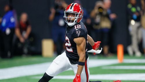 Atlanta Falcons wide receiver KhaDarel Hodge (12) reacts after scoring the game-winning touchdown during overtime against the Tampa Bay Buccaneers on Thursday, October 3, 2024, at Mercedes-Benz Stadium in Atlanta. The Falcons won 36-30.
(Miguel Martinez/ AJC)