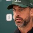 New York Jets quarterback Aaron Rodgers (8) speaks during a press conference in Ware, England, Friday, Oct. 4, 2024, ahead of the game between New York Jets and Minnesota Vikings at the Tottenham Hotspur stadium on Sunday. (AP Photo/Alastair Grant)