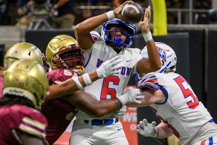 Brookwood’s defense sacks Kaeden Gilstrap, quarterback for Walton, during the Corky Kell Classic at Mercedes-Benz Stadium on August 17, 2024. (Jamie Spaar for the Atlanta Journal Constitution)