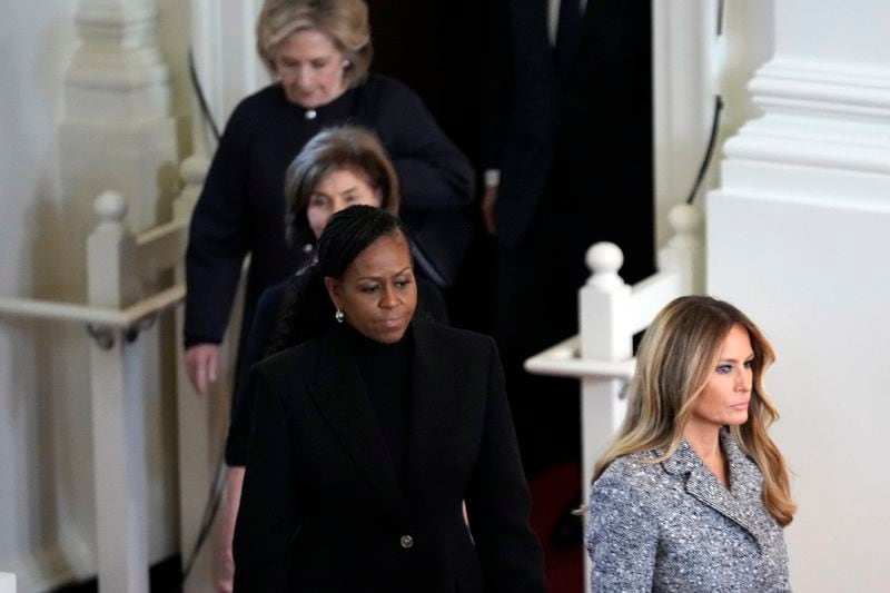 FILE - Former first ladies from right, Melania Trump, Michelle Obama, Laura Bush and Hillary Clinton, arrive for a tribute service for former first lady Rosalynn Carter, at Glenn Memorial Church, Nov. 28, 2023, in Atlanta. (AP Photo/Andrew Harnik, File)