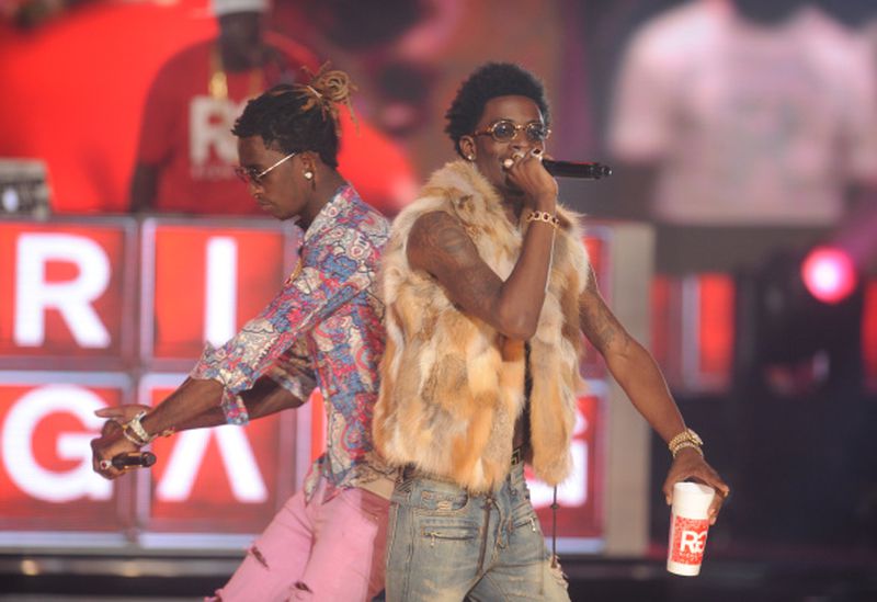 Rappers Young Thug (left) and Rich Homie Quan perform onstage during the BET Hip Hop Awards 2014 at Boisfeuillet Jones Atlanta Civic Center on September 20, 2014 in Atlanta. (Brad Barket/Getty Images for BET)