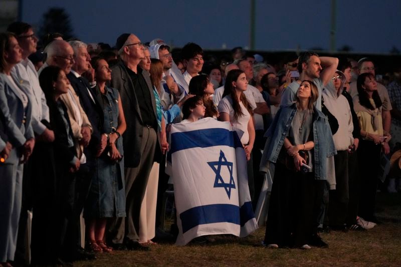 Members of the Jewish community gather at a park in Sydney, Australia, on Monday, Oct. 7, 2024, as mourners marked the anniversary of the Oct. 7, 2023, attack. (AP Photo/Rick Rycroft)