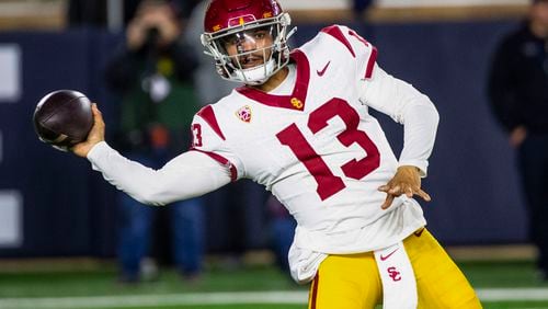 Southern California quarterback Caleb Williams throws a pass during the first half an NCAA college football game against Notre Dame, Saturday, Oct. 14, 2023, in South Bend, Ind. (AP Photo/Michael Caterina)