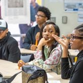 Students participate in an Advanced Placement African American Studies class at Maynard Jackson High School on Friday, Feb 17, 2023, when the class was a pilot in Georgia. Students discussed historic and current events, presented class projects and considered why restrictions are being put on the course in other states. (Jenni Girtman for The Atlanta Journal-Constitution)