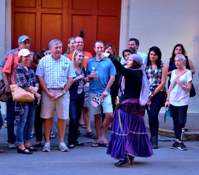 A guide recounts spooky tales on the 5-in-1 New Orleans Ghost & Mystery Tour. 
Courtesy of Haunted History Tours.