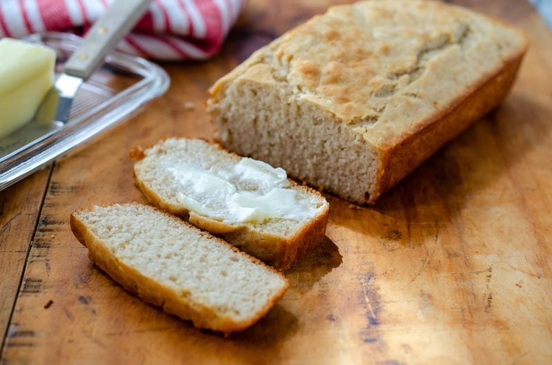 A loaf of warm Beer Bread, ready to be slathered in butter. (Virginia Willis for The Atlanta Journal-Constitution)