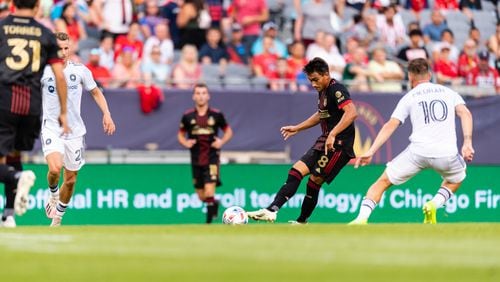 Atlanta United forward Tyler Wolff #28 kicks the ball during the first half of the match against Chicago Fire FC at Soldier Field in Chicago, Illinois on Saturday July 3, 2021. (Photo by Jacob Gonzalez/Atlanta United)