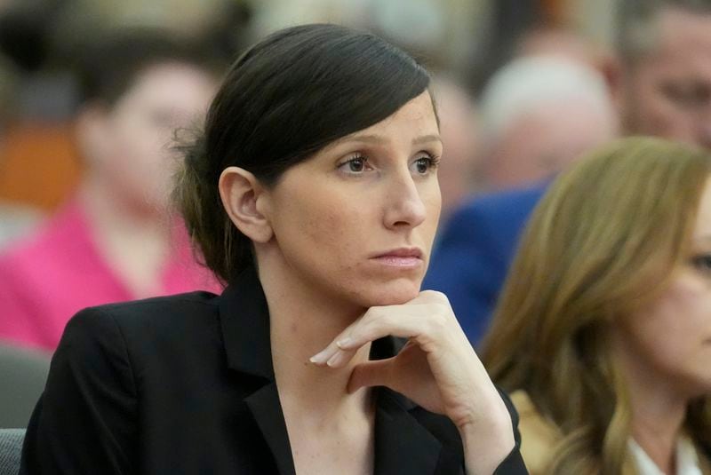 Kouri Richins, a Utah mother of three who wrote a children's book about coping with grief after her husband's death and was later accused of fatally poisoning him, looks on during a hearing Monday, Aug. 26, 2024, in Park City, Utah. (AP Photo/Rick Bowmer, Pool)