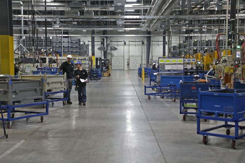 The assembly department at the Springfield Topre plant. Representatives of the company say they are taking additional preventive measures amid statewide coronavirus concerns. BILL LACKEY/STAFF