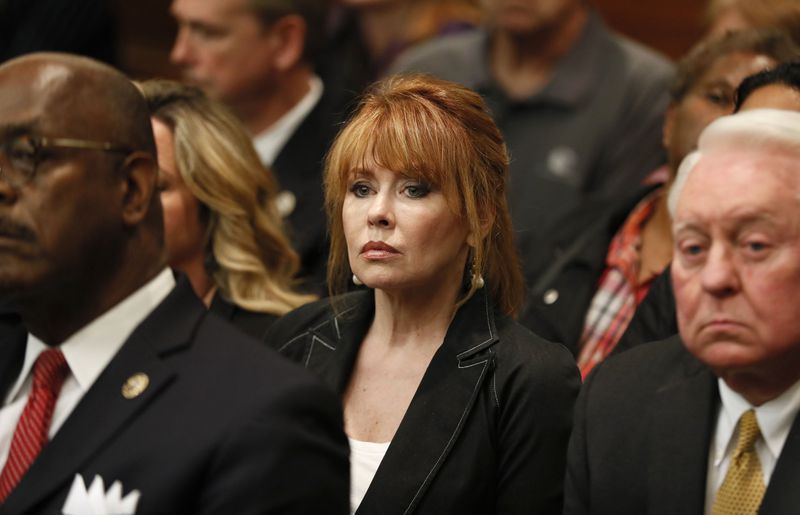 4/23/18 - Atlanta -Dani Jo Carter listens to the verdict.  The jury found Tex McIver guilty on four of five charges on their fifth day of deliberations today at the Tex McIver murder trial at the Fulton County Courthouse.   Bob Andres bandres@ajc.com