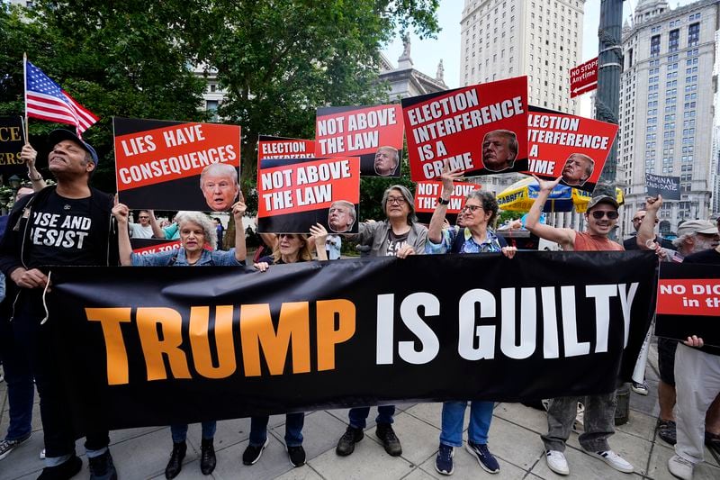 Anti-Trump demonstrators celebrate his 34 felony convictions near Manhattan Criminal Court on Thursday.