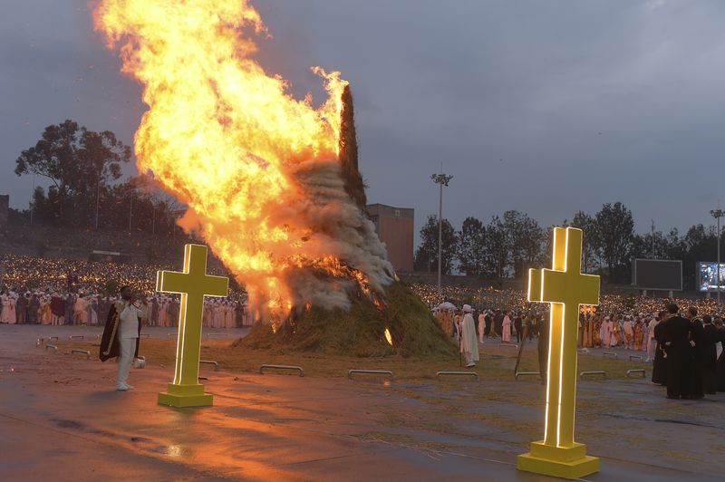 Religious leaders and Ethiopians celebrate Meskel, meaning the Cross in Amharic, is an annual religious holiday among Orthodox in Addis Ababa, Ethiopia Thursday, Sept. 26, 2024. (AP Photo)