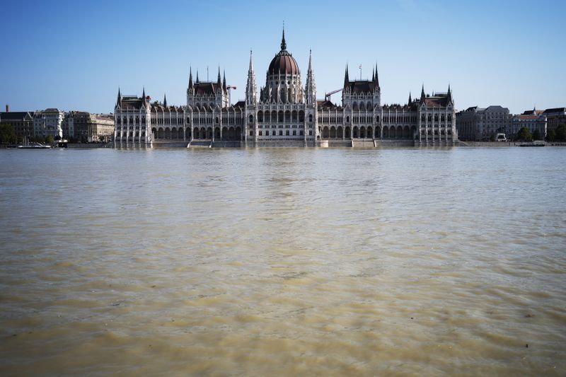 General view of the Parliament building as the Danube river floods its banks, central Budapest, Hungary, Thursday, Sept. 19, 2024. (AP Photo/Denes Erdos)