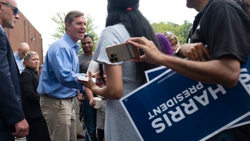 Kentucky Gov. Andy Beshear shakes hands after campaigning for Vice President Kamala Harris at a campaign event and office opening in Cumming on Sunday, July 28, 2024.   (Ben Gray / Ben@BenGray.com)