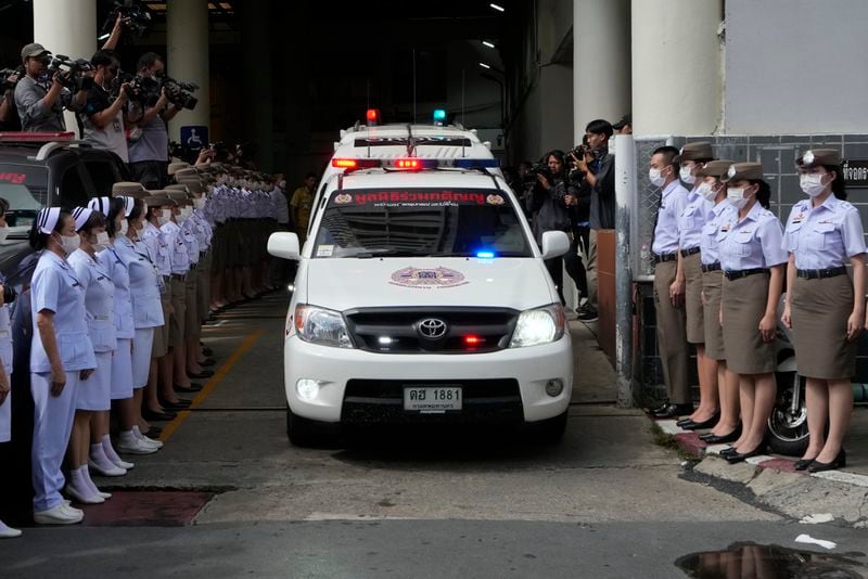 An ambulance carrying a body leaves from the Police hospital in Bangkok, Thailand, Wednesday, Oct. 2, 2024, (AP Photo/Sakchai Lalit)