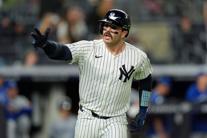 New York Yankees' Austin Wells reacts after hitting a three-run home run during the seventh inning of a baseball game against the Kansas City Royals at Yankee Stadium Monday, Sept. 9, 2024, in New York. (AP Photo/Seth Wenig)