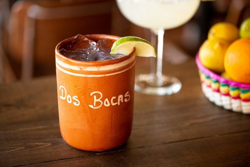 Dos Bocas Roadside Cantarita, Jalisco's own roadisde punch, El Jimador tequila, fresh citrus and a touch of salt, in a handmade clay mug. Photo credit- Mia Yakel.