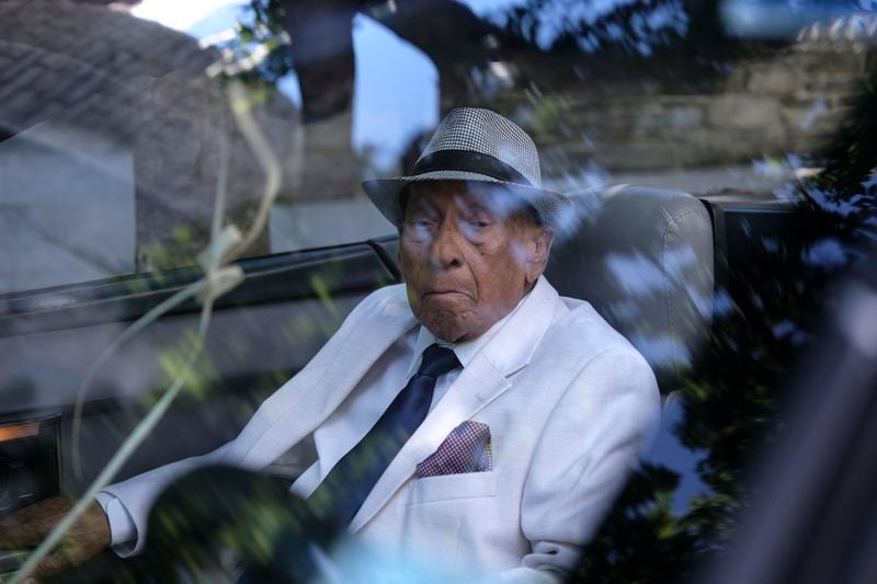 Francisco Fernandez, 95, poses for a portrait outside St. Peter the Apostle Catholic Church in Reading, Pa., on Sunday, June 9, 2024. (AP Photo/Luis Andres Henao)